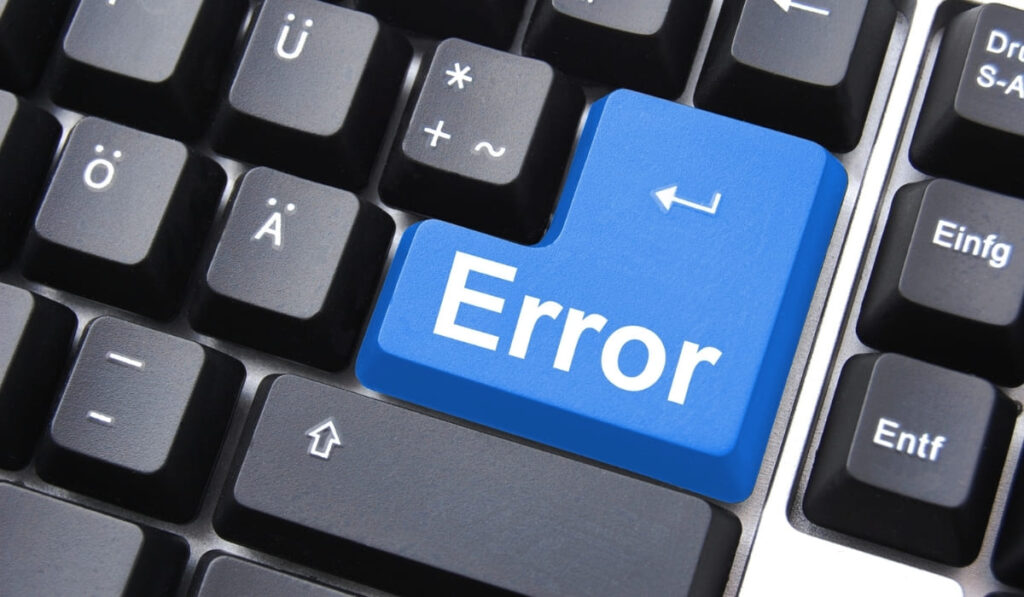 Clavier d'ordinateur avec touche error mise en évidence illustrant les erreurs de saisie courantes sur les connaissements maritimes